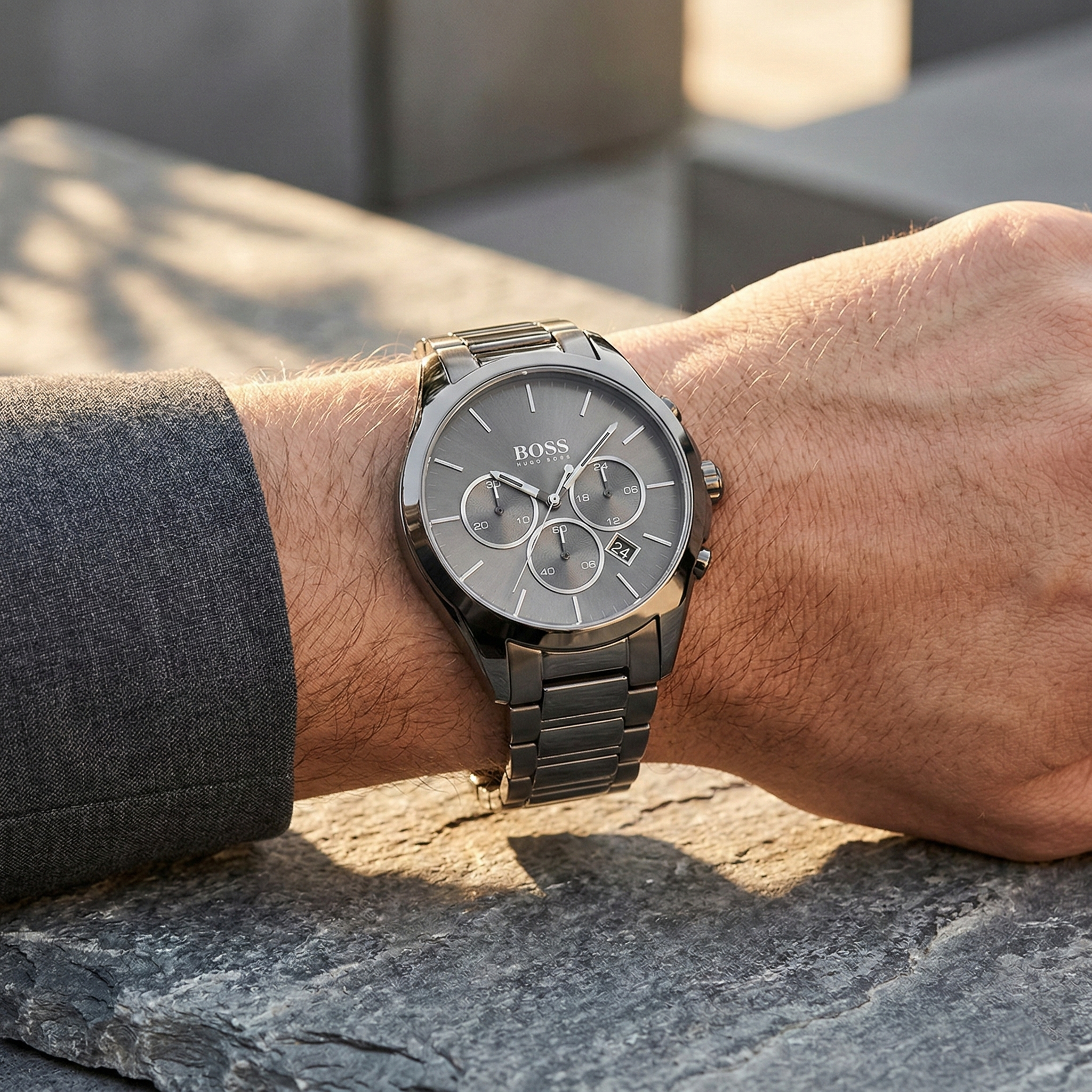 Close up of Hugo Boss Onyx 1513364 on wrist showing gray dial and gray metal strap with 50m water resistance