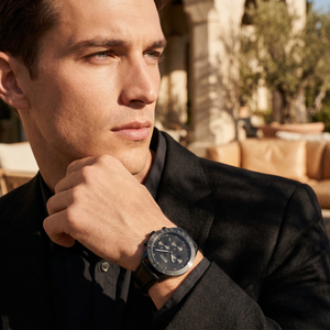 Professional man wearing Hugo Boss Talent 1513590 with black dial and black case leather strap water resistant 50m
