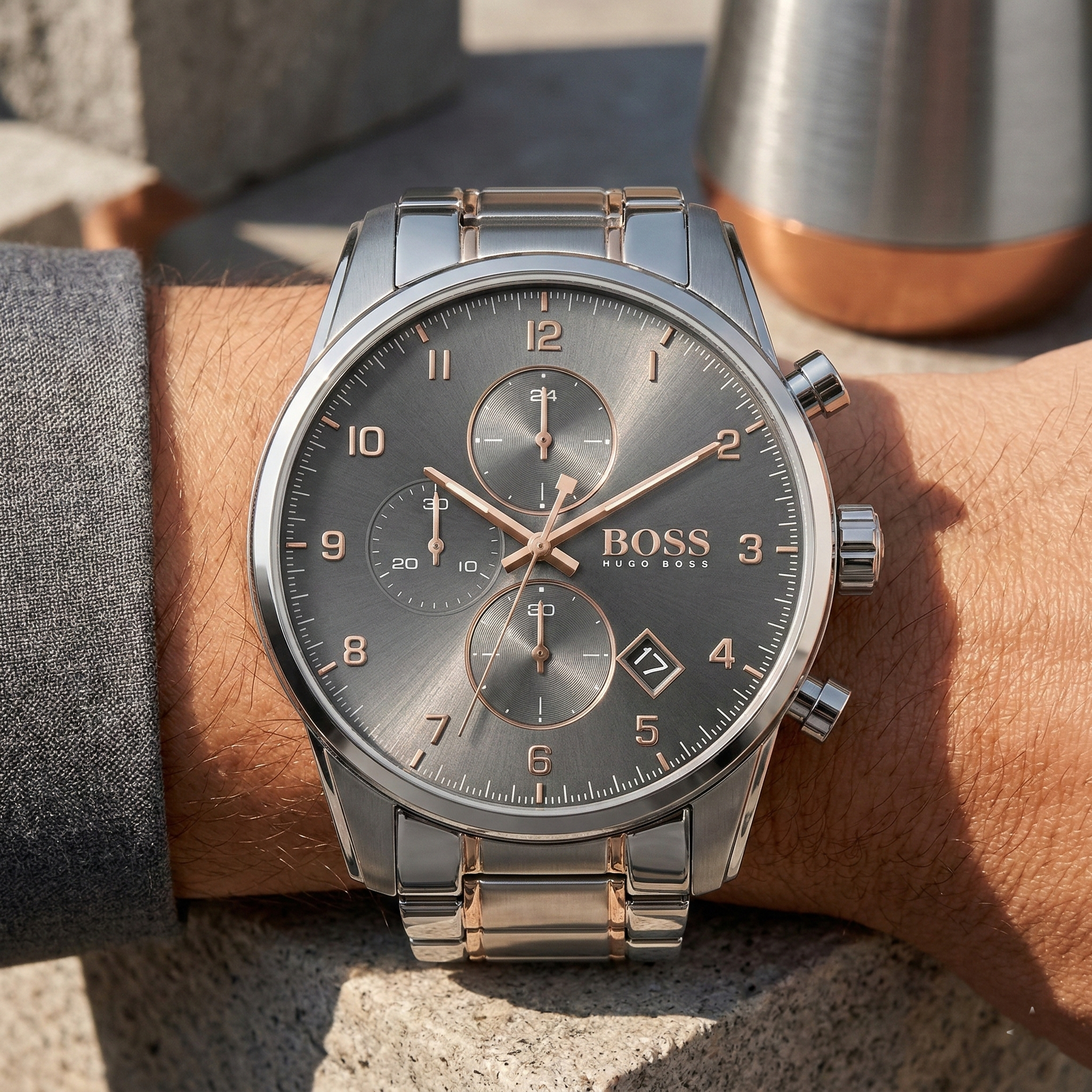 Close up of Hugo Boss Skymaster 1513789 on wrist showing gray dial and two-tone metal strap with 50m water resistance