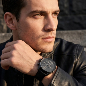 Professional man wearing Hugo Boss Champion 1513880 with black dial and black case leather strap water resistant 100m