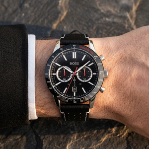 Close up of Hugo Boss Allure 1513920 on wrist showing black dial and black leather strap with 50m water resistance