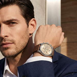 Professional man wearing Hugo Boss View 1513990 with beige dial and brown leather strap water resistant 50m