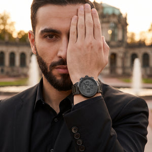 Lifestyle luxury shot featuring Hugo Boss One 1514001 men's watch.