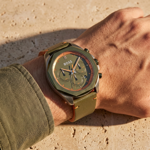 Close up of Hugo Boss Cloud 1514018 on wrist showing green dial and green leather strap with 50m water resistance