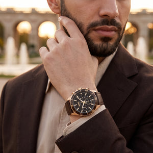 Lifestyle luxury shot featuring Hugo Boss Troper 1514100 men's watch.