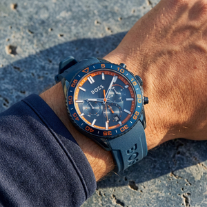 Close up of Hugo Boss Volane 1514142 on wrist showing blue dial and blue rubber strap with 50m water resistance