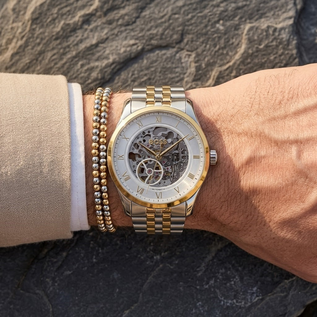 Close up shot of Hugo Boss 1514237 on wrist showing the transparent mechanical movement and gold Roman numerals