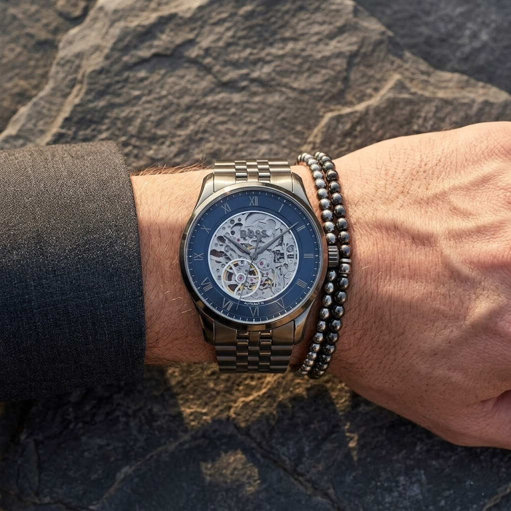 Close up shot of Hugo Boss 1514254 on wrist showing the transparent mechanical movement and blue dial