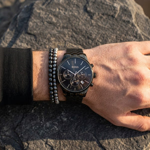 Close up shot of Hugo Boss 1514256 on wrist showing black sunray dial and rose gold-tone hands