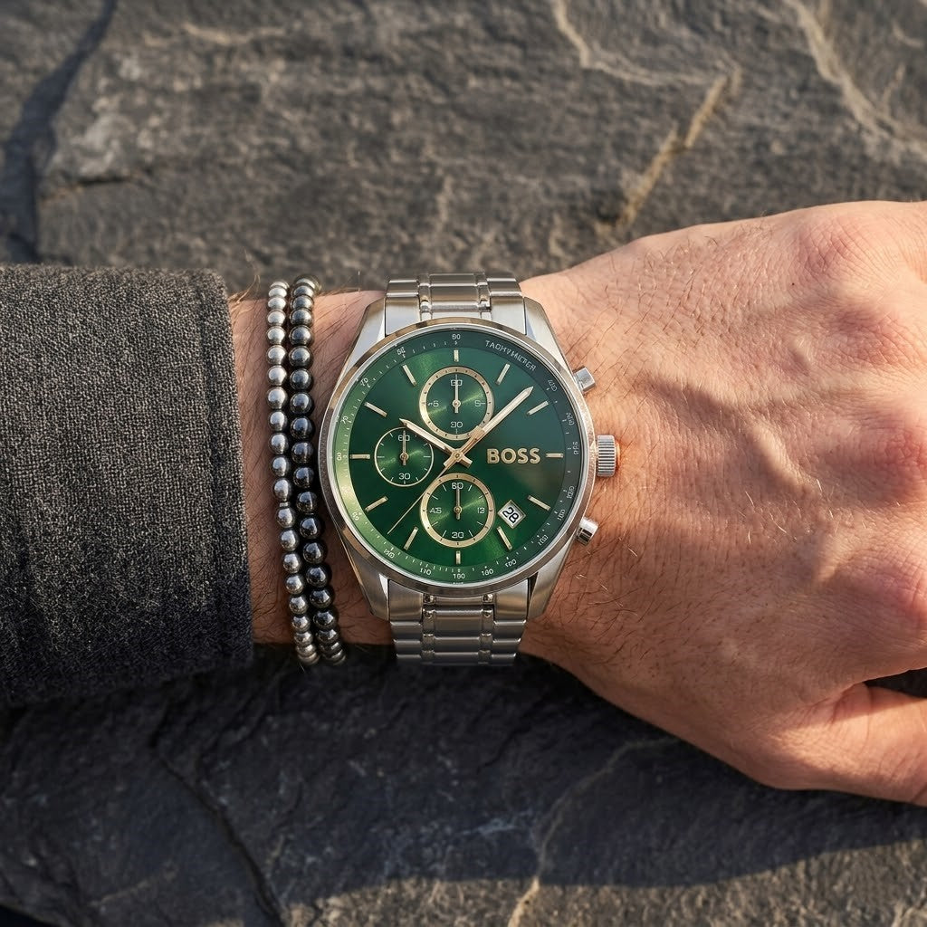 Close up shot of Hugo Boss 1514265 on wrist showing green dial and gold-tone sub-dial rings