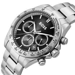 Silver watch with black dial on a white background
