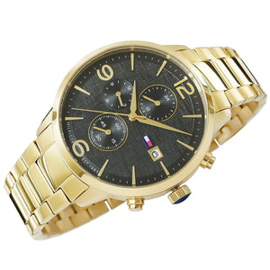 Right angled view of Tommy Hilfiger Liam 1710362 men's quartz battery watch highlighting gold finish and black dial accents
