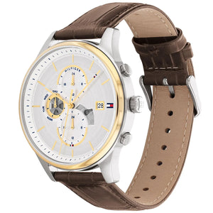 Angled real-life photo of Tommy Hilfiger 1710501 showing the two-tone case and leather texture