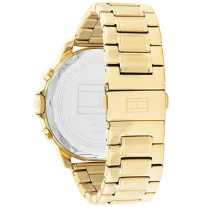 Caseback of Tommy Hilfiger Luca 1710511 men's quartz battery watch showing technical specs black dial and gold metal bracelet
