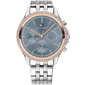 Tommy Hilfiger Ari 1781976 women's watch featuring a silver-tone case, slate blue dial, and a rose gold-tone bezel encrusted with crystals