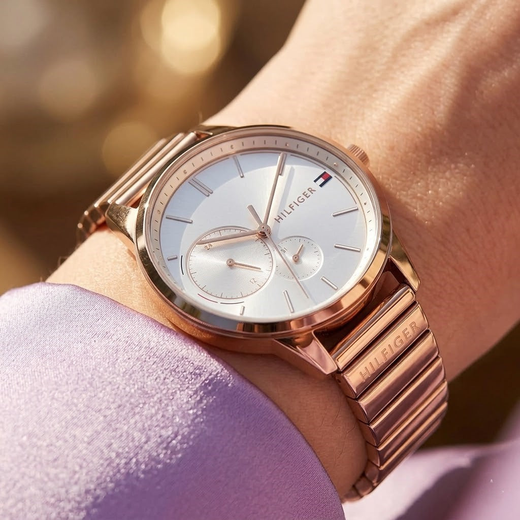 Close up shot of Tommy Hilfiger 1782021 on wrist showing silver dial and rose gold-tone sub-dials