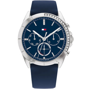 Tommy Hilfiger Kennedy 1782389 women's watch featuring a silver-tone case with crystal accents, navy blue dial, and navy blue rubber strap