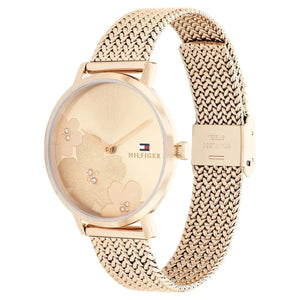 Left angled view of Tommy Hilfiger Carnation 1782603 women's quartz battery watch showing Rose Gold mesh strap and Rose Gold case profile