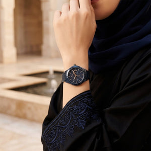 Lifestyle photo of Tommy Hilfiger 1782656 showing the elegant navy blue watch on a woman's wrist