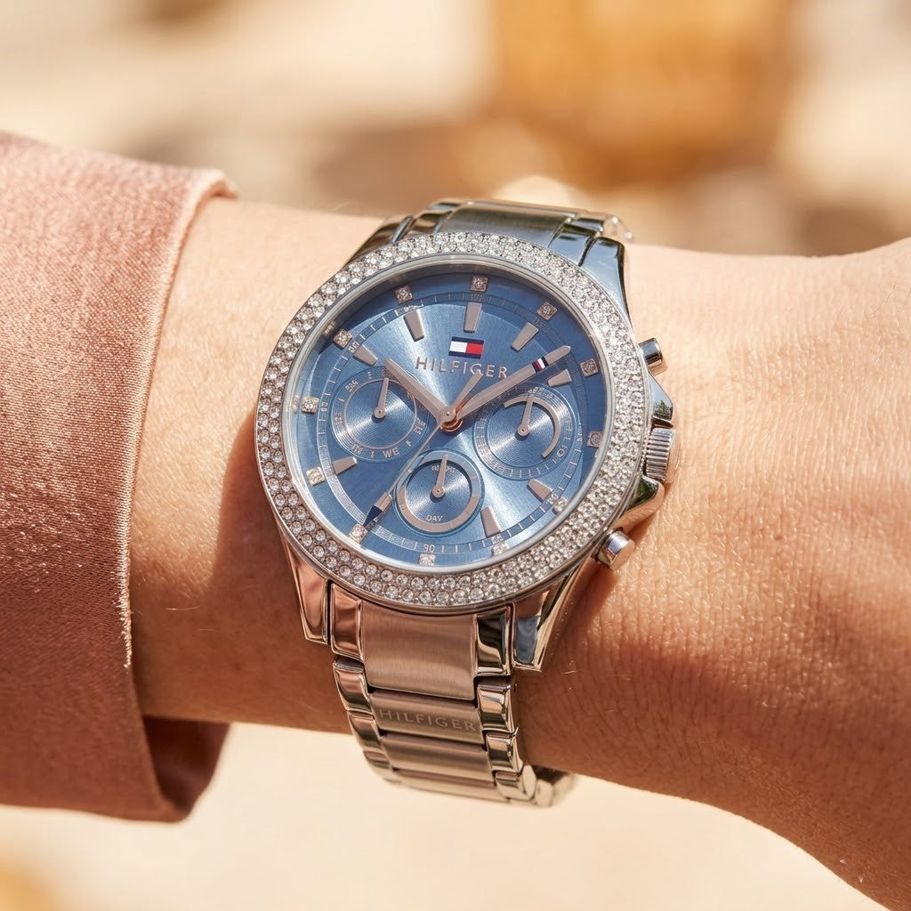 Close up shot of Tommy Hilfiger 1782690 on wrist showing crystal bezel and rose gold-tone hands