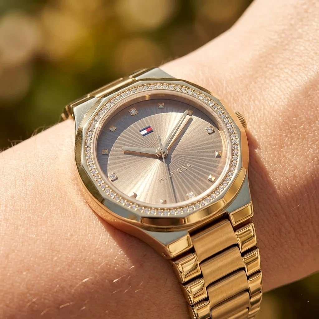 Close up shot of Tommy Hilfiger 1782725 on wrist showing bronze sunray dial and gold-tone hands