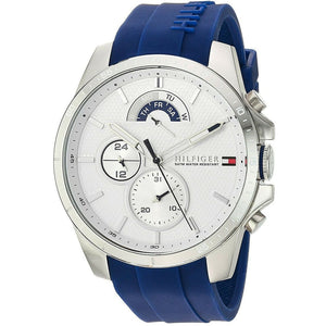 Left angled view of Tommy Hilfiger Decker 1791349 men's quartz battery watch showing blue rubber strap and silver-tone case profile