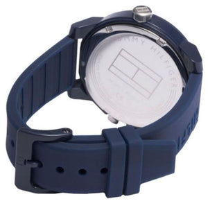 Caseback of Tommy Hilfiger Denim 1791556 men's quartz battery watch showing technical specs blue dial and rubber strap