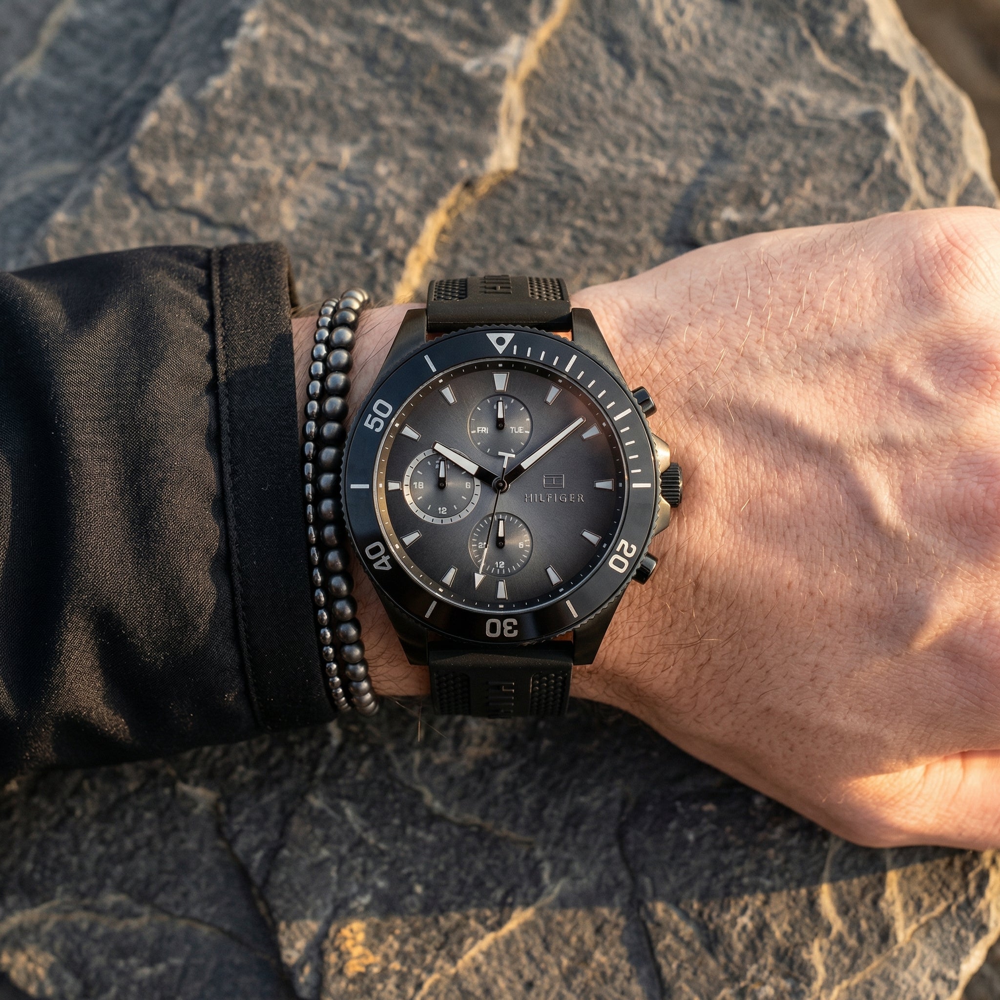 Close up shot of Tommy Hilfiger 1791921 on wrist showing black dial and sub-dial counters