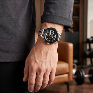 Lifestyle photo of Tommy Hilfiger 1792181 showing the bold silver watch on a man's wrist