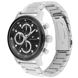 Angled real-life photo of Tommy Hilfiger 1792181 showing the polished silver bezel and black dial detail