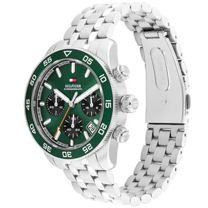 Angled real-life photo of Tommy Hilfiger 1792214 showing the silver case and green bezel