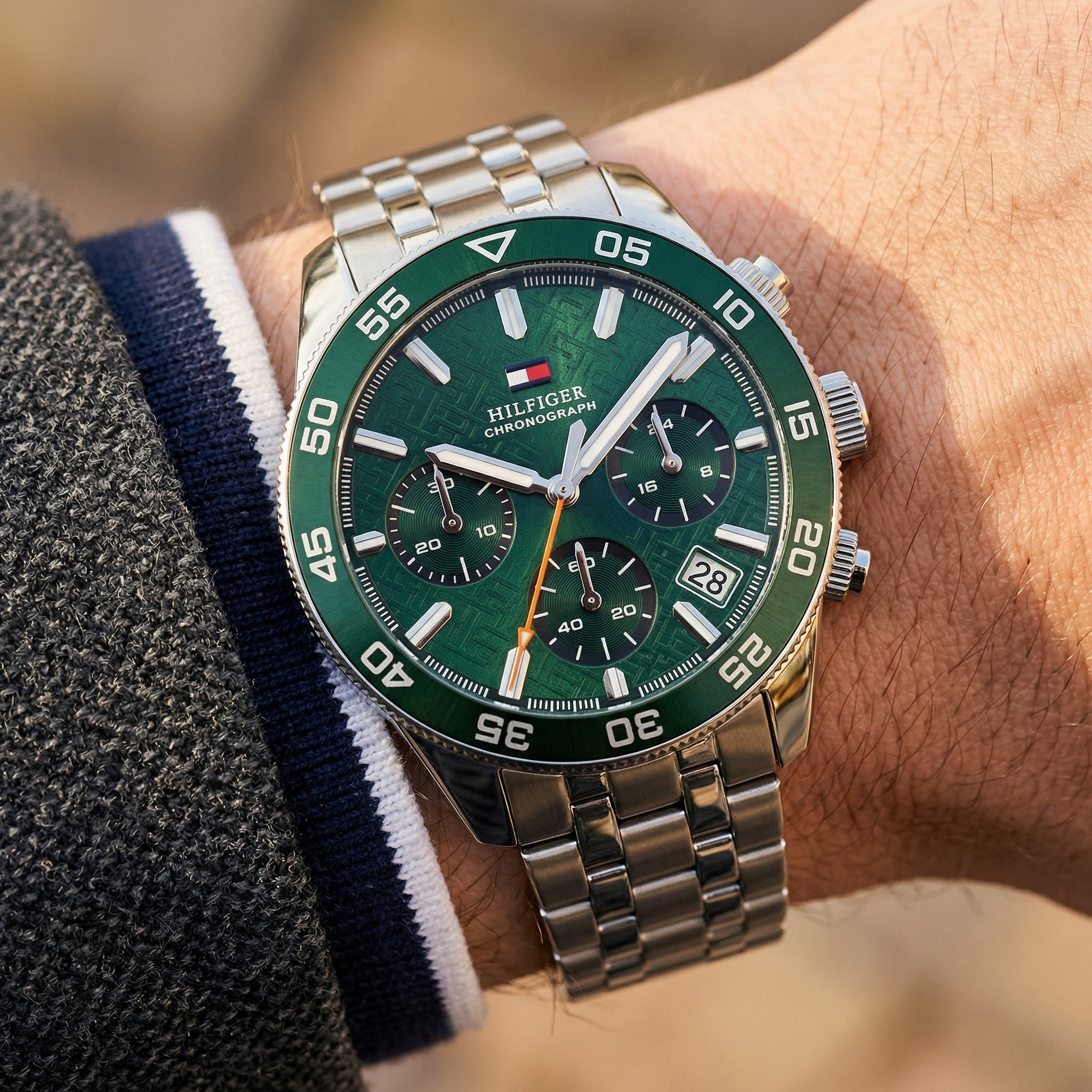 Close up shot of Tommy Hilfiger 1792214 on wrist showing green dial and chronograph details
