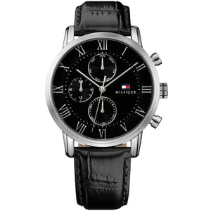 Tommy Hilfiger Kane 1791401 men's watch featuring a silver stainless steel case, black multi-function dial with Roman numerals, and black leather strap