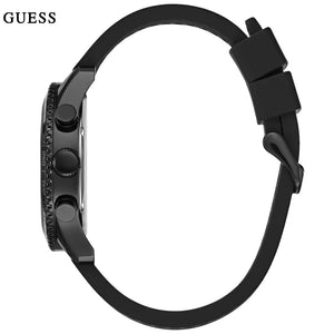 4. Angled view of Guess W0971G1 showing the matte black tachymeter bezel and side pushers