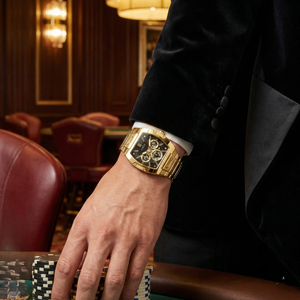 AI lifestyle shot of a man wearing the gold and black Guess Phoenix watch