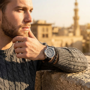 Elegant man wearing Maserati Successo R8871621006 men's quartz battery watch with silver case and luxury gray dial