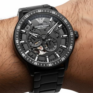 Close up of the AR60054 black skeleton dial showing the intricate automatic movement and sub-dials