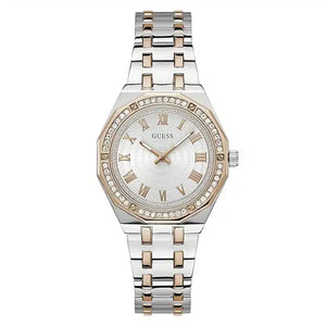 A Guess women's two-tone stainless steel and rose gold watch with a white dial, Roman numeral hour markers, and a bezel accented with small clear crystals, shown on a plain white background.