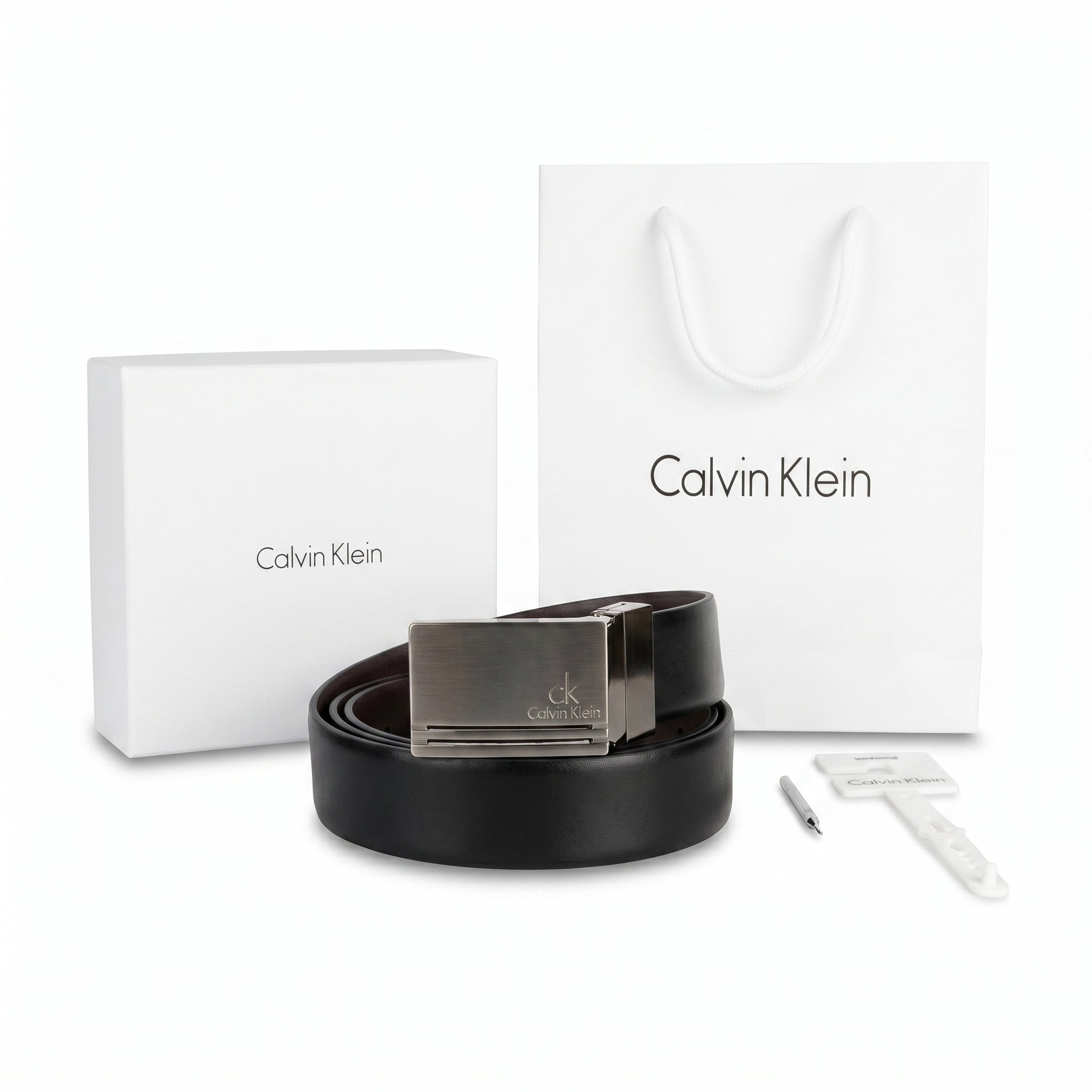 Professional standing view of the Calvin Klein mirror original reversible leather belt featuring the polished silver designer buckle