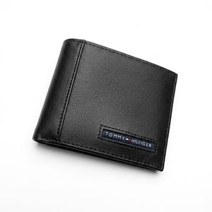 Macro close-up view showing the high-quality genuine leather texture and precision embossed ck monogram on the wallet