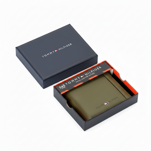 Tommy Hilfiger men's olive green smooth leather wallet presented inside its original navy blue branded gift box