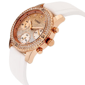 Right angled view of Guess Confetti W1098L5 women's multi-function watch highlighting polished rose gold finish and cushion case details