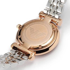 Close-up of a watch with a rose gold case and silver band on a white background
Detailed view of Emporio Armani AR1840 rose gold and silver bracelet clasp