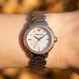 Close up shot of AR11569 highlighting the mother of pearl dial with rose gold markers and crystal bezel