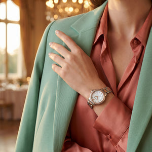 Female model wearing Emporio Armani Mia two-tone watch for an elegant everyday luxury look