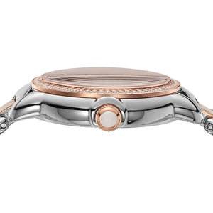 Close-up of a silver and rose gold watch on a white background