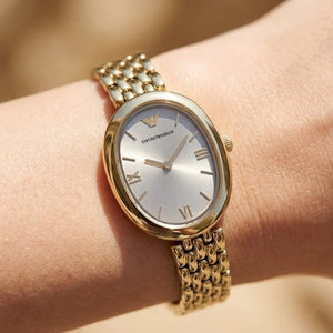 Close up shot of Emporio Armani AR11707 on wrist showing the delicate gold case and gray sunray dial