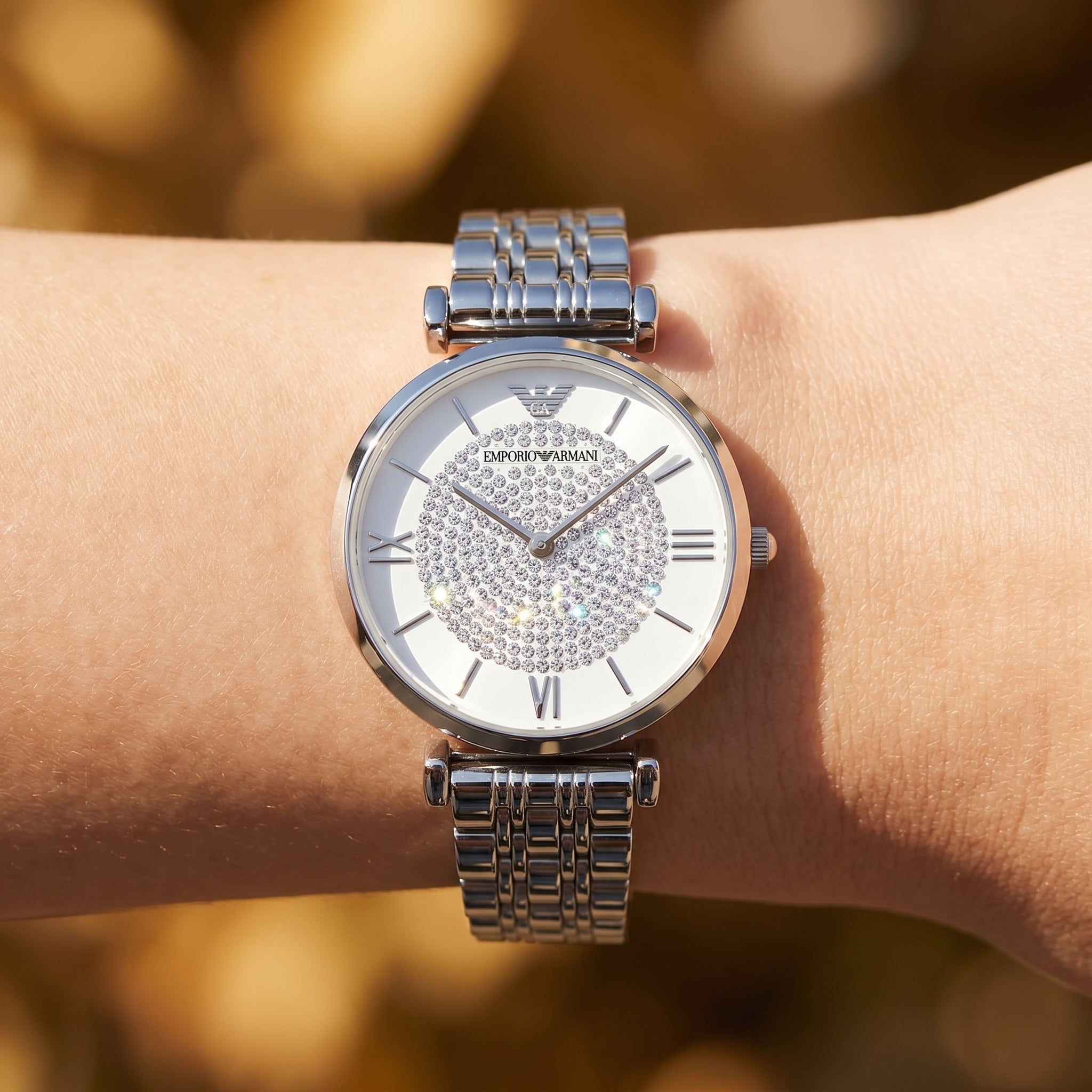Close up shot of AR1925 highlighting the white dial with stunning crystal pave center and silver hands