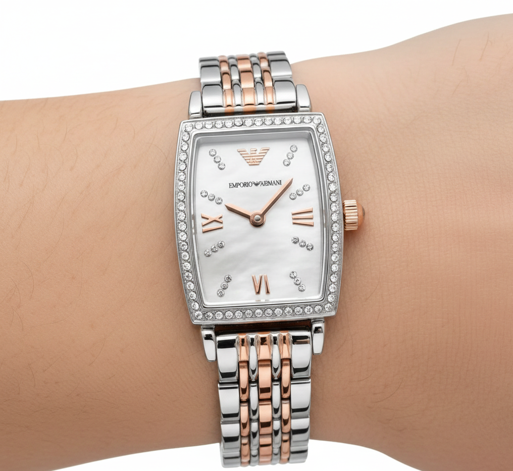 Extreme close-up of Armani AR11519 rectangular case showing crystals and pearl dial