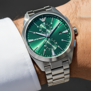 Extreme wrist macro of Armani AR11480 showing green sunray dial and tachymeter flange